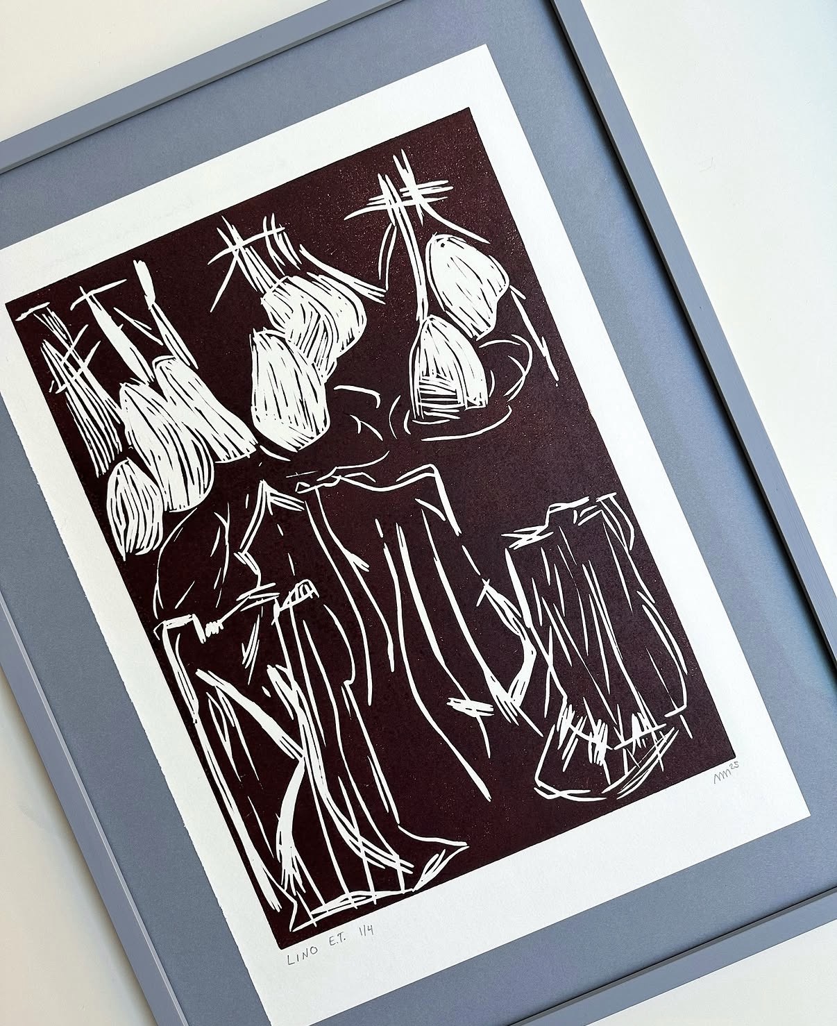 Framed lino print artwork in the gallery's collection