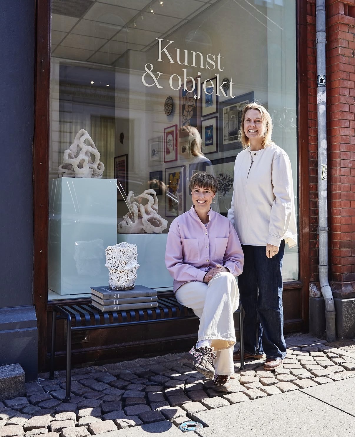 Kunst & Objekt gallery interior — contemporary artworks in handmade frames